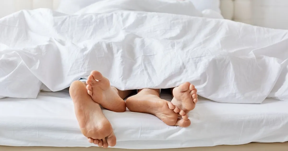 Woman with a confident smile and smooth neck, illustrating self-assurance and wellness with OHH Shot