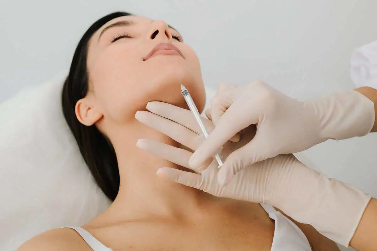 A woman is receiving Kybella in Kingston, TN at Kim Bell MedSpa